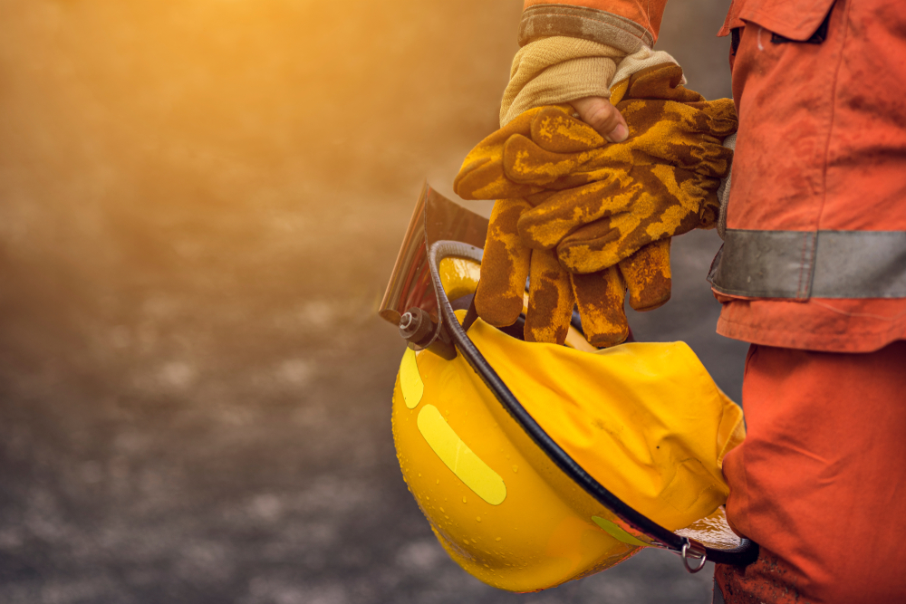 firefighter holding helmet - ICCS/CAD Supplier and Sector day